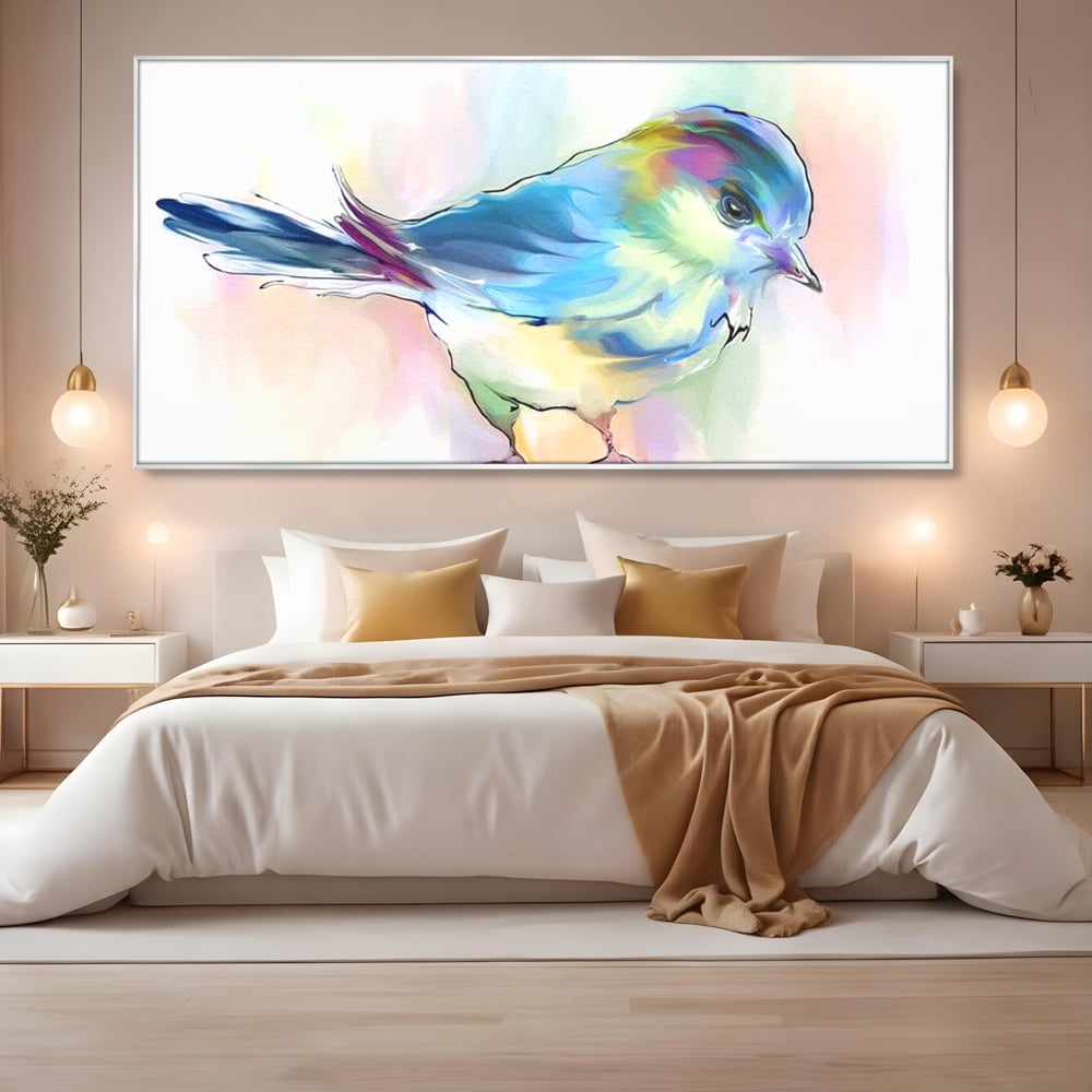 Tablou canvas cu tablou canvas cu pasare colorata in acuarela, in rama de aluminiu argintiu, pe perete intr-un dormitor